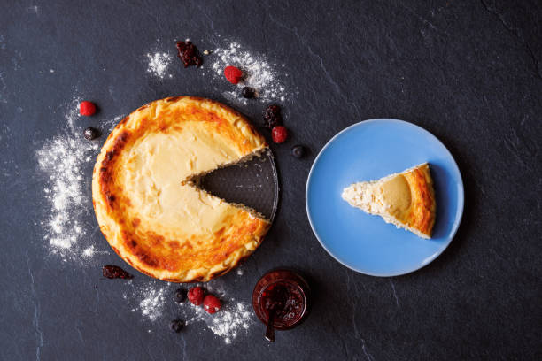 istock Cheesecake slice with strawberry jam, overhead view 1465610305