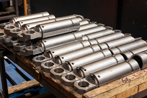 Stacked, steel, hydraulic cylinders for use in production