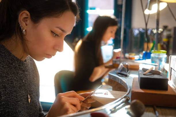 istock Woman jeweller working 1465617216