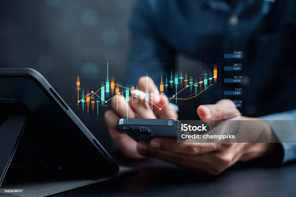 Businessmen investor think before buying stock market investment using smartphone to analyze trading data. investor analysis with stock exchange graph on screen. Financial stock market. Stock Market and Exchange Stock Photo