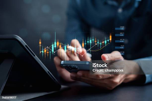 Businessmen Investor Think Before Buying Stock Market Investment Using Smartphone To Analyze Trading Data Investor Analysis With Stock Exchange Graph On Screen Financial Stock Market Stock Photo - Download Image Now