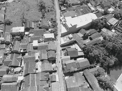 Black and white photo of bird's eye view of settlements in the Cikancung area - Indonesia.