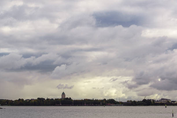 istock Scenic view of sea against cloudy sky 1465619840