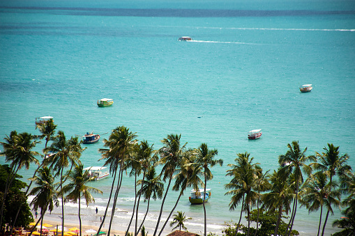 Boats moored at Maragogi beach, known as the Brazilian Caribbean, in the State of Alagoas