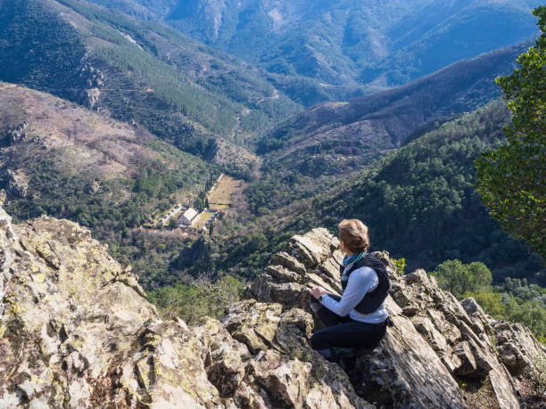 istock Woman observing the landscape 1465623996