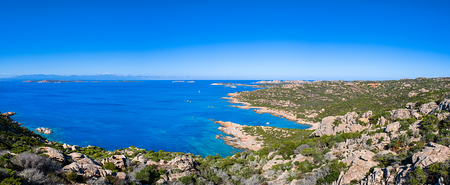 Cloudy sky over Spiaggia del Riso in Villasimius. Sardinia, Italy