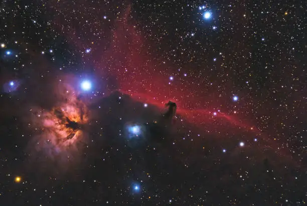 The Horsehead Nebula in Orion. The Flame Nebula NGC 2024, the deep red nebula strip IC 434 with the Horsehead Nebula. Photographed with an 80mm refracting telescope.