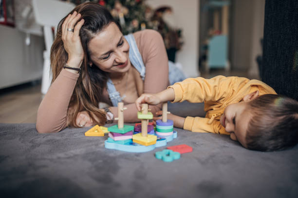 istock Mother and son playing together 1465626211