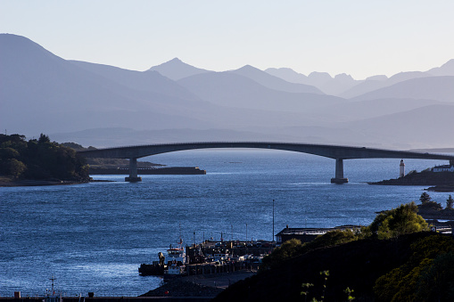 Skye Bridge, with the distant bue mountains from the Isle of Skye in the background. Skey bridge connects the Isla of Skye at Drochaid an Eilein Sgitheanaich, with the SCottish mainland at Kyle of Lochalsh.
