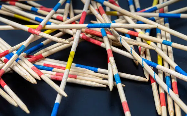 High angle view of mikado sticks against black background