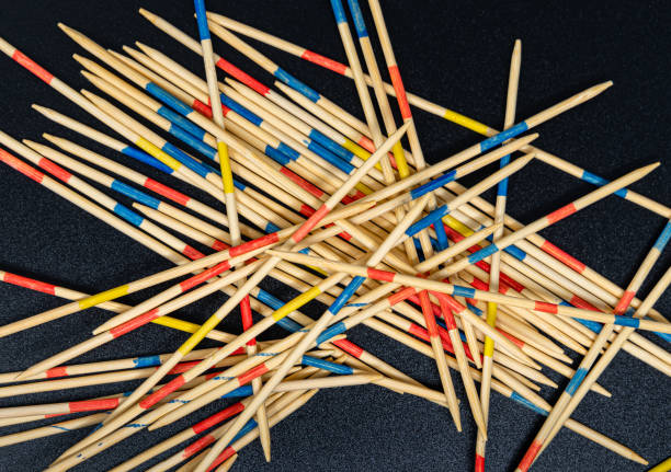 istock High angle view of mikado sticks against black background 1465631201