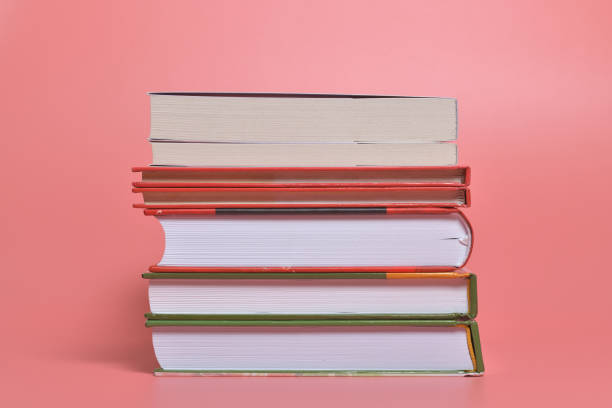 istock Books isolated on pink background 1465631947