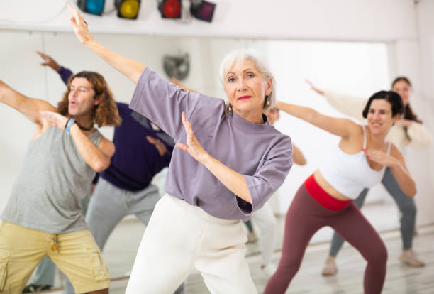istock Group of adult people practices dance aerobics 1465631996
