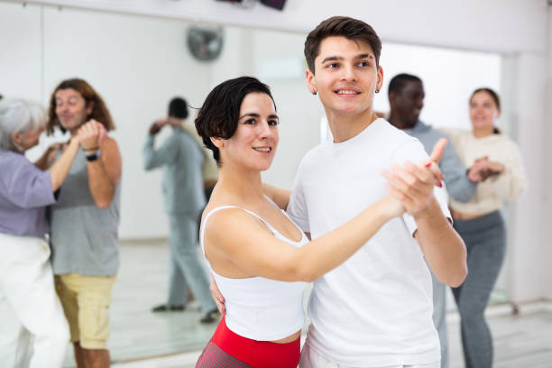 istock Positive couple of dancers learns a slow foxtrot 1465632316