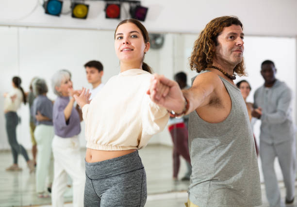 istock Confident couple of dancers enjoys a partner dance 1465632409