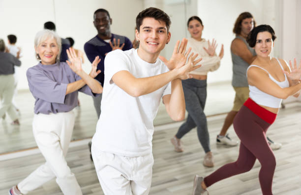 istock Group of people practicing energetic lindy hop movements 1465632533