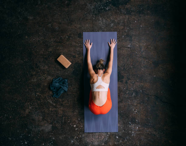 istock An Unrecognizable Beautiful Blonde Sportswoman Stretching While Doing Yoga 1465633878