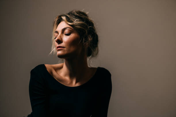 istock An Attractive Blonde Woman Looking Away 1465634010