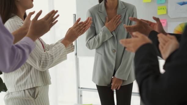 istock Businesswoman proficiently present work project receive celebrations from team . Corporate business team collaboration concept . 1465635644