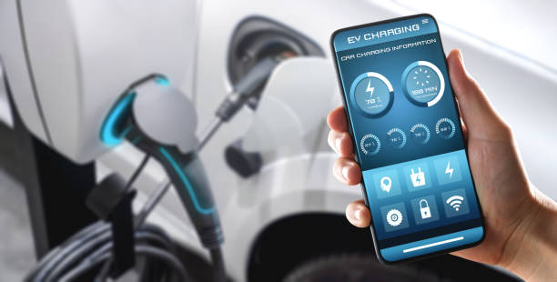 EV charging station for electric car with mobile app display charger status . The electric power is produced from sustainable resources to supply to charger station in order to reduce CO2 emission . estación de carga ev para coche eléctrico con estado del cargador de pantalla de aplicación móvil. la energía eléctrica se produce a partir de recursos sostenibles para suministrar a la estación de carga con el fin de reducir la emisión de co2.
