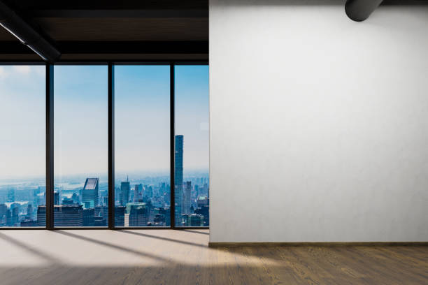 istock large office with blank white wall and copy space in front of panoramic window skyline view, 3D Illustration 1465644361