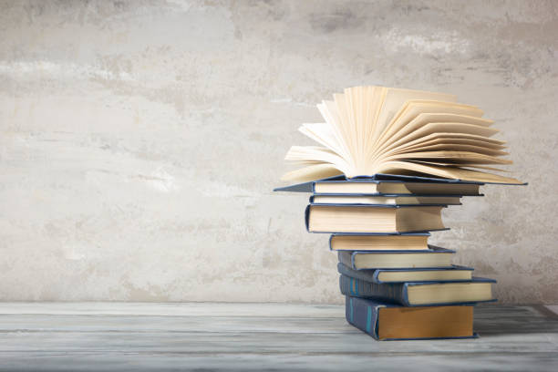 istock Vintage old hardback books. Education background. Back to school. Copy Space. 1465649239