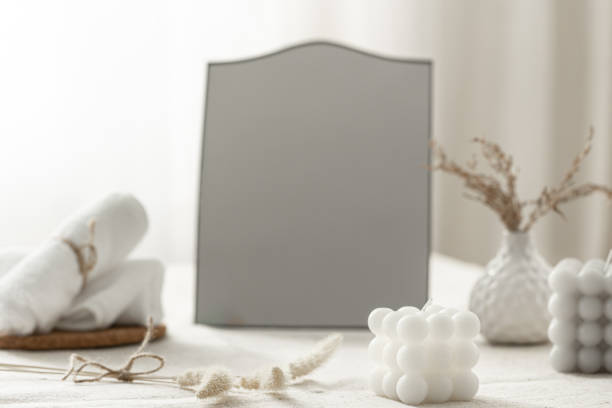 istock A cozy composition with a mirror and decorative details in a bright room interior. 1465649362