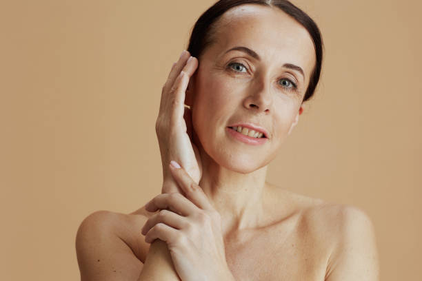 istock modern woman posing isolated on beige background 1465649809