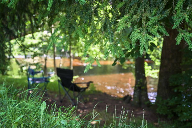 istock Camping Chairs at the River in the Black Forest, Germany 1465650587