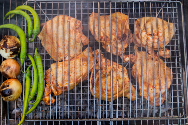 Three Onions And Meats On The Grill