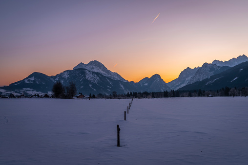 Landscape in sunrise frosty morning in Admont town in Austria