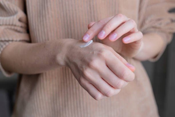 istock Woman uses hand cream. Self care concept. 1465659008