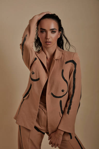 istock Wet haired woman in a brown suit. 1465670291