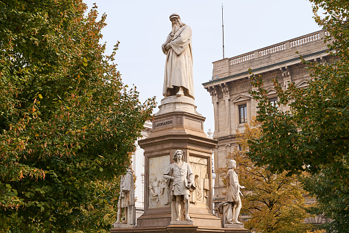 Monument to Leonardo da Vinci built by Pietro Magni in 1872 in Milan, Italy on Piazza della Scala. You can also see the sculpture dedicated to Marco d'Oggiono.