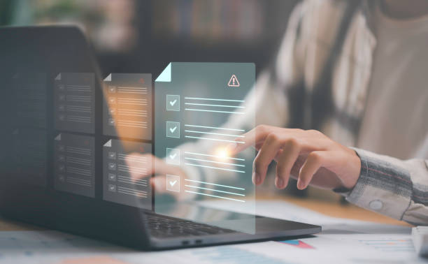 istock Businessman checking the steps through a virtual online document with a list of checkboxes Concepts of practices and policies, company articles of association Terms and Conditions, Finding errors 1465670677
