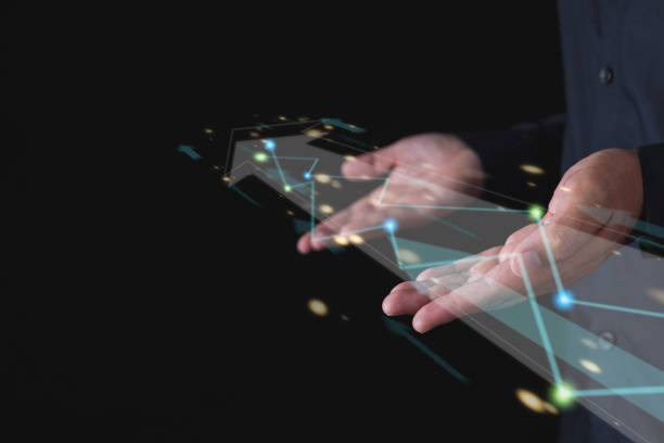istock Business goes to the next level. Both hands support the virtual arrow with light paths. Isolated on black background. Manipulation concept. 1465686161