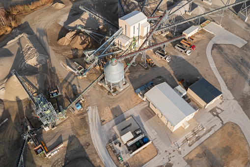 Aerial view of gravel and sand pit producing sand materials for construction industry.