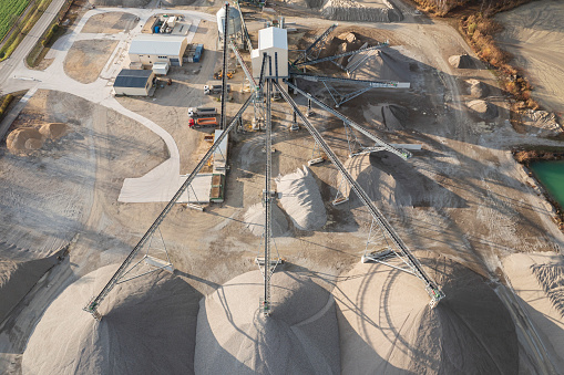 Aerial view of gravel and sand pit producing sand materials for construction industry.