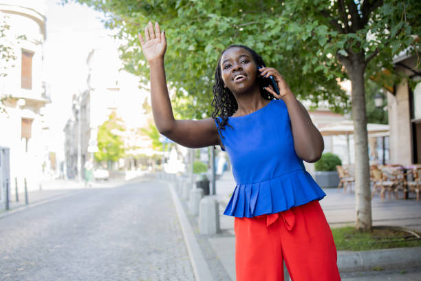 istock Happy young woman using phone 1465697567