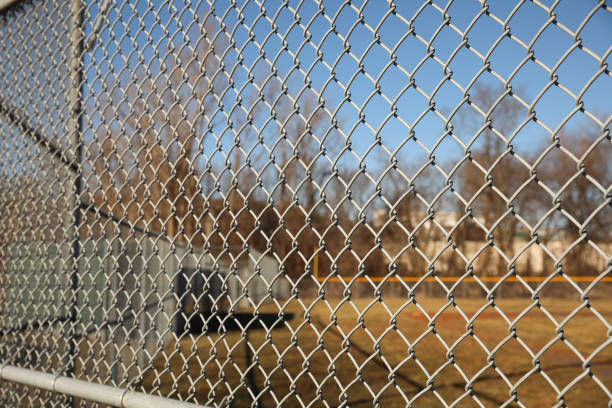 istock Metal chain link fence used for protection 1465710775