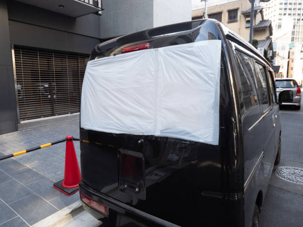 istock A car with a damaged rear window and emergency treatment 1465711380