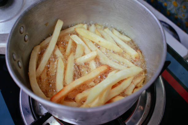 istock making delicious french fries 1465716453