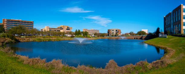 Pensacola City Skyline over the Community Maritime Park with Water Fountains in Florida, USA, modern downtown with open space and walking trails stock photo