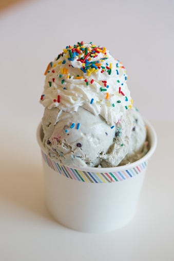 Cup of ice cream with sprinkles