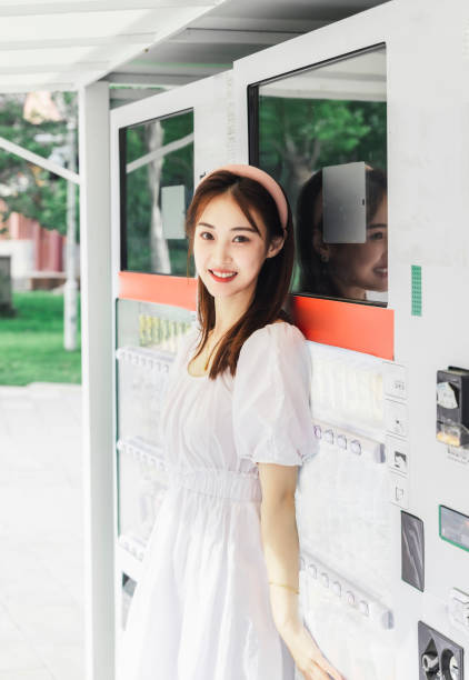 istock The girl at the vending machine 1465734937