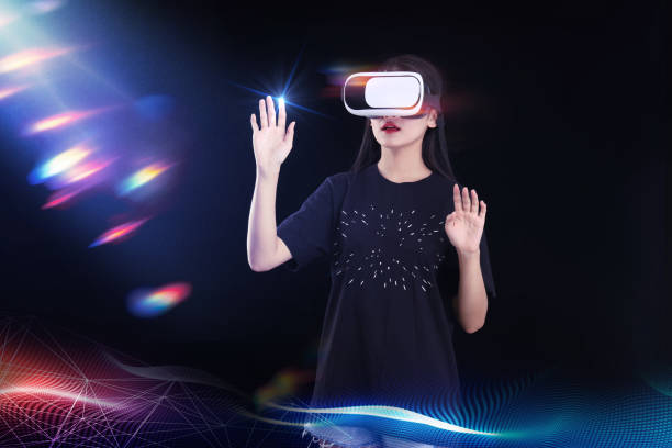 istock A woman wearing VR glasses 1465735042