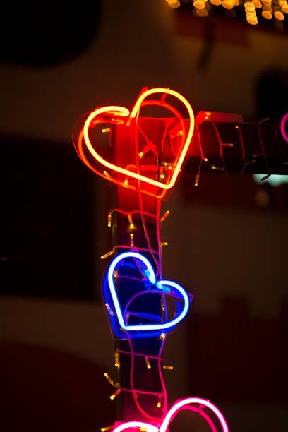 istock Multicolored neon heart on the street. Valentine's Day 1465746606