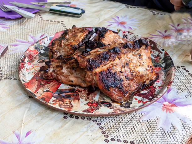 istock hot meat in a plate cooked on a grill on the grill 1465746880