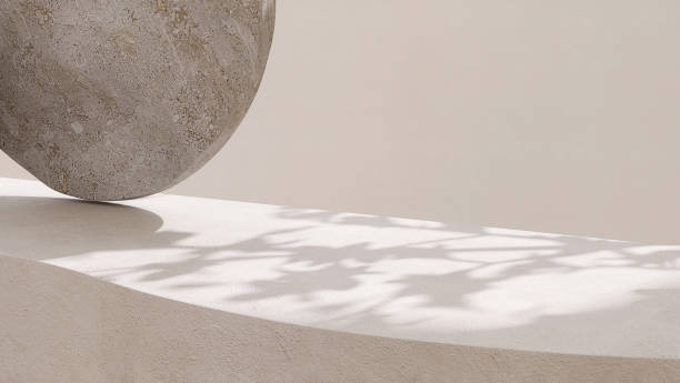istock Blank beige curve concrete counter podium with texture, soft sunlight, leaf shadow on wall, gray flat round rock 1465749904