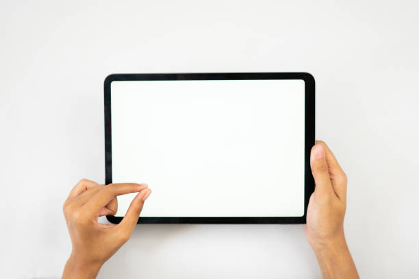 istock Hand holding and pinch tablet horizontally for mockups 1465751573